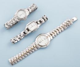 LOTE DE TRES RELOJES FESTINA EN METAL PLATEADO Y DORADO CON CORREA DE METAL ,FESTINA  NO SE PUEDE COMPROBAR SU FUNCIONAMIENTO,MOVIMIENTO CUARZO.UNO DE LOS RELOJES TIENE EL CIERRE ROTO 