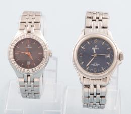 LOTE DE DOS RELOJES FESTINA EN METAL PLATEADO CON CORREA DE METAL ,FESTINA  NO SE PUEDE COMPROBAR SU FUNCIONAMIENTO,MOVIMIENTO CUARZO. 