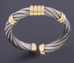 SORTIJA EN ORO DE 18KT Y ACERO