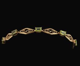 PULSERA EN ORO 18KT Y PERIDOTOS