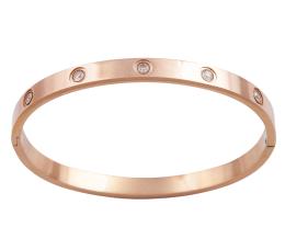 PULSERA RÍGIDA EN METAL CHAPADO EN ORO ROSA CON CIRCONITAS