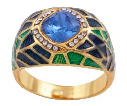 SORTIJA EN METAL CHAPADO EN ORO, PIEDRA AZUL Y CIRCONITAS