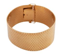 BRAZALETE ANCHO EN ORO 18KT
