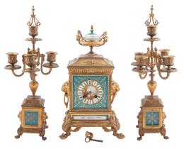 RELOJ CON GUARNICIÓN EN BRONCE DORADO