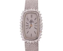 RELOJ OMEGA EN ORO 18KT Y BRILLANTES. CUERDA MANUAL