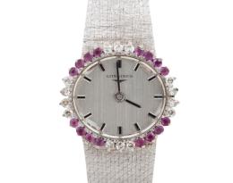 RELOJ LONGINES EN ORO 18KT, DIAMANTES Y RUBÍES. CUERDA MANUAL