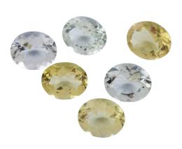 CUARZOS PRASIOLITAS Y CUARZOS LIMÓN EN TALLAS OVALES, CON PESO TOTAL DE 24.60 CT
