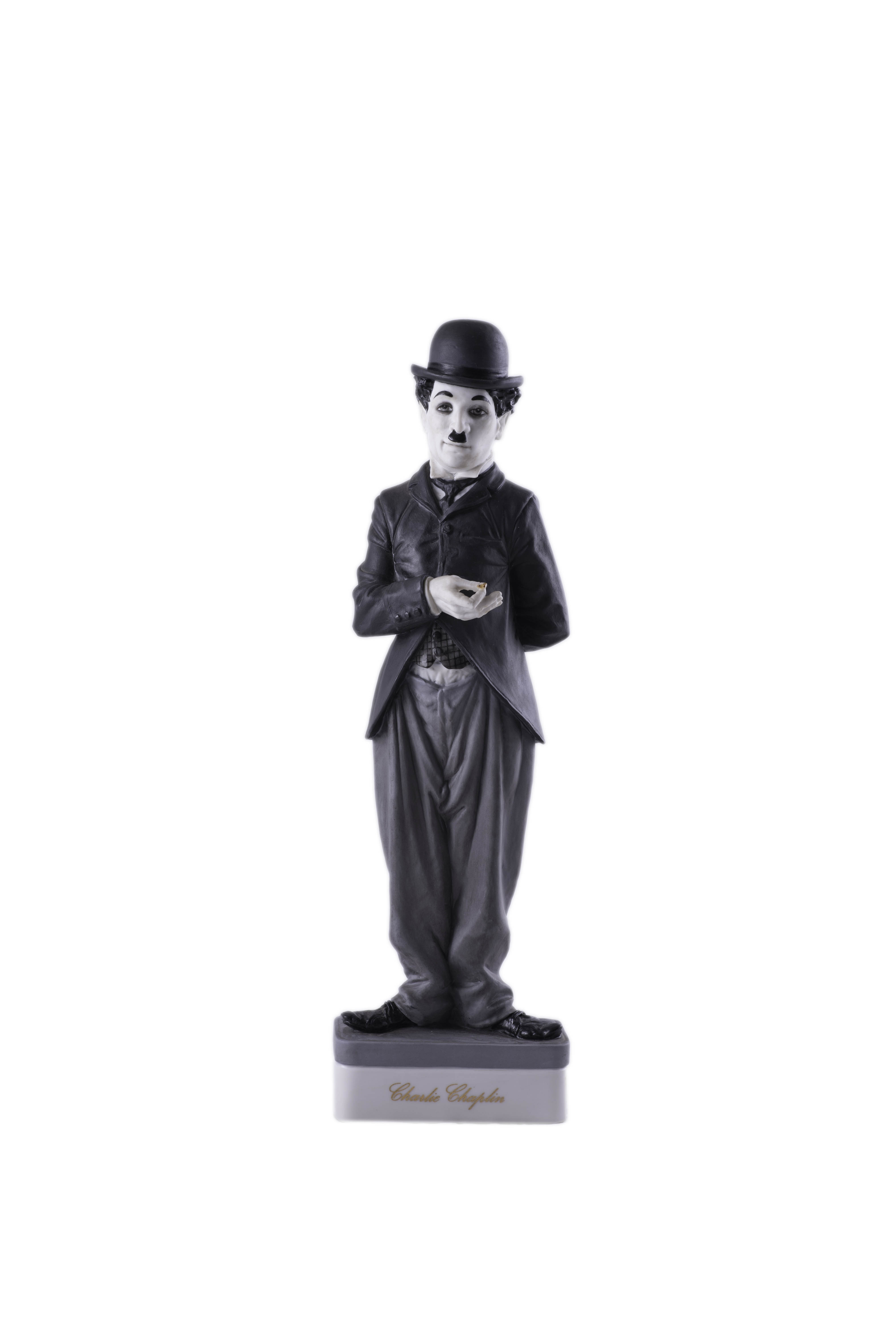 CHARLIE CHAPLIN, FIGURA DE BISCUIT POLICROMADO, PERTENECIEN