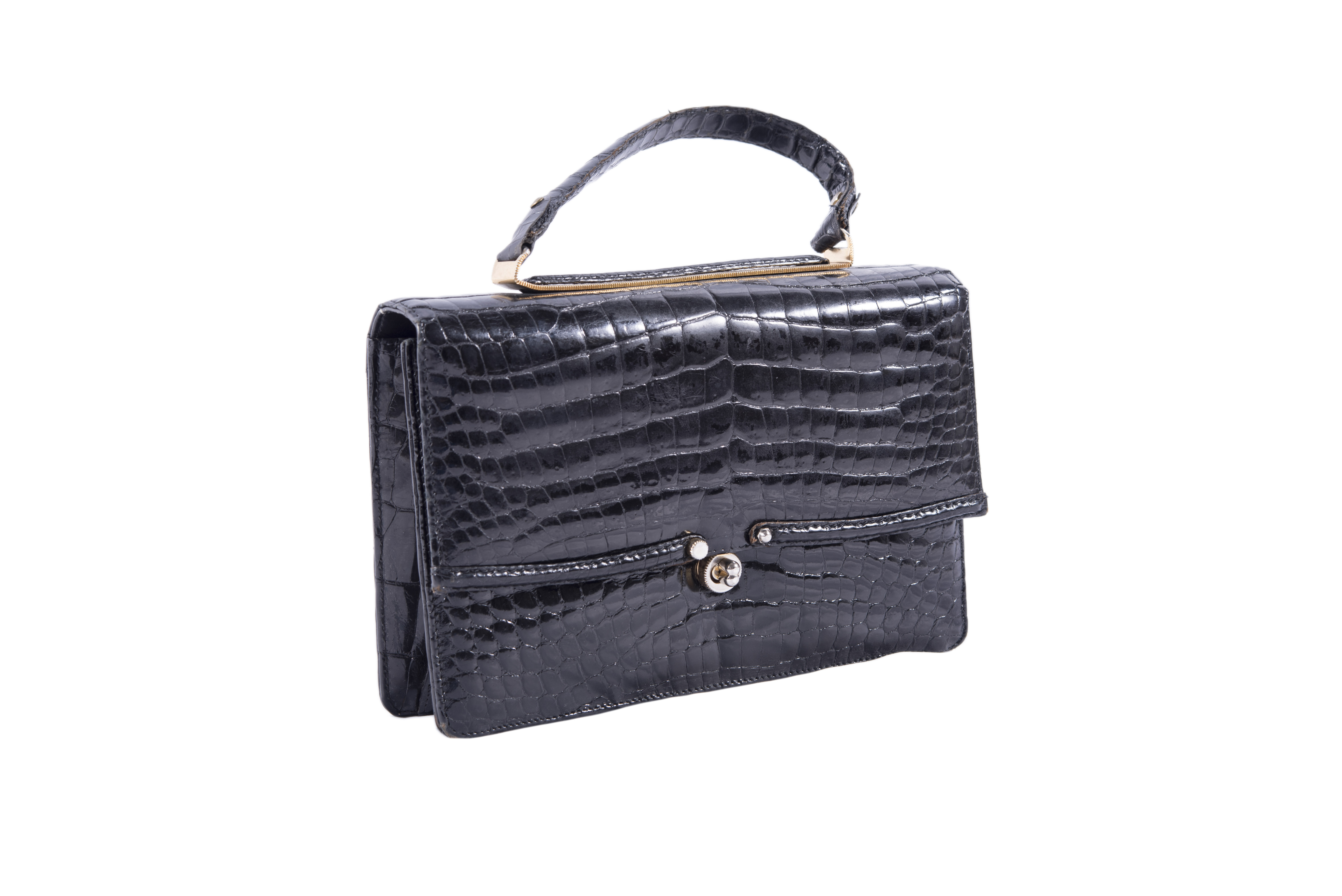 BOLSO DE PIEL DE COCODRILO EN COLOR NEGRO, LOEWE, 1846.
