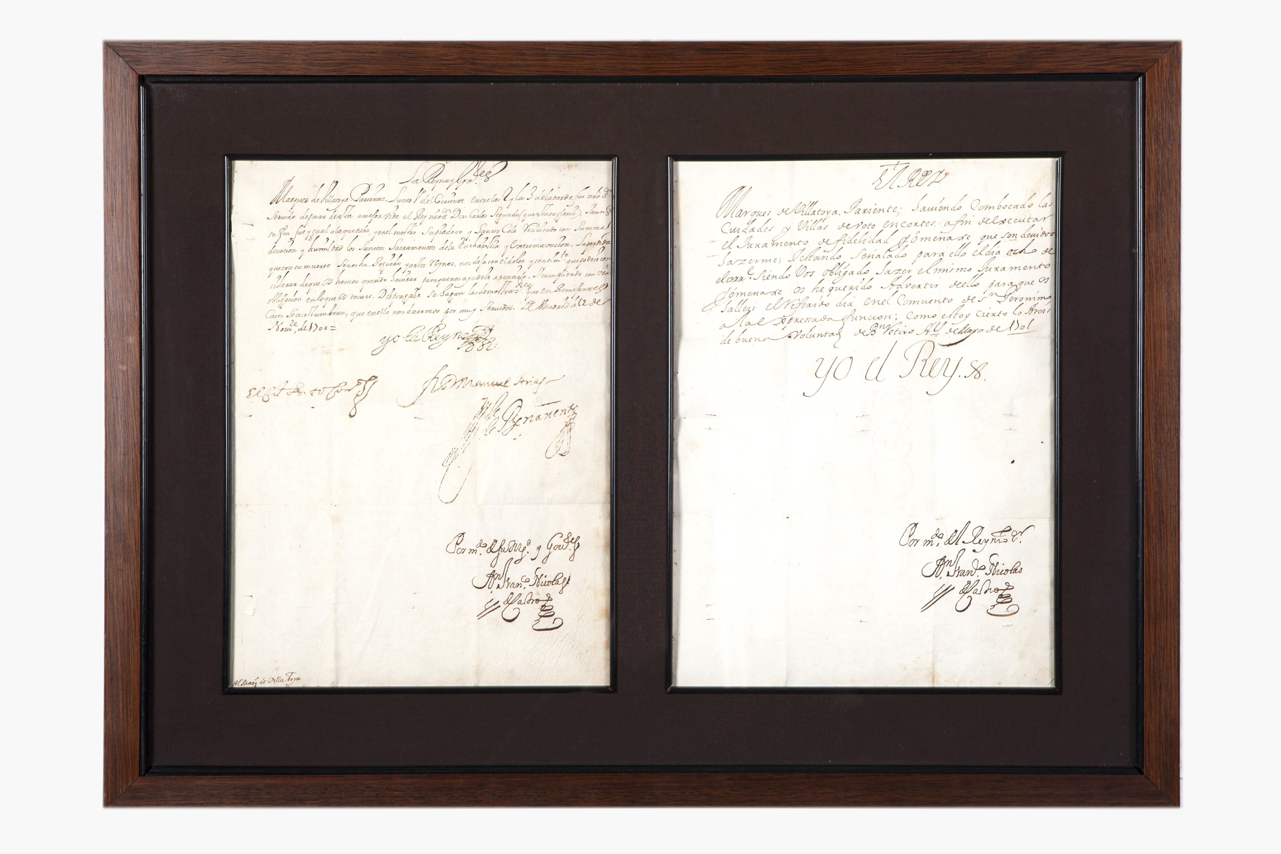 Dos manuscritos enmarcados juntos firmados por Felipe V, di