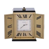 CARTIER. PEQUEÑO RELOJ DESPERTADOR DE SOBREMESA. SIGLO XX.