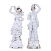 Pareja de picaflores isabelino en porcelana, siglo XX.