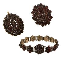 Conjunto de pulsera colgante y broche en formas florales c
