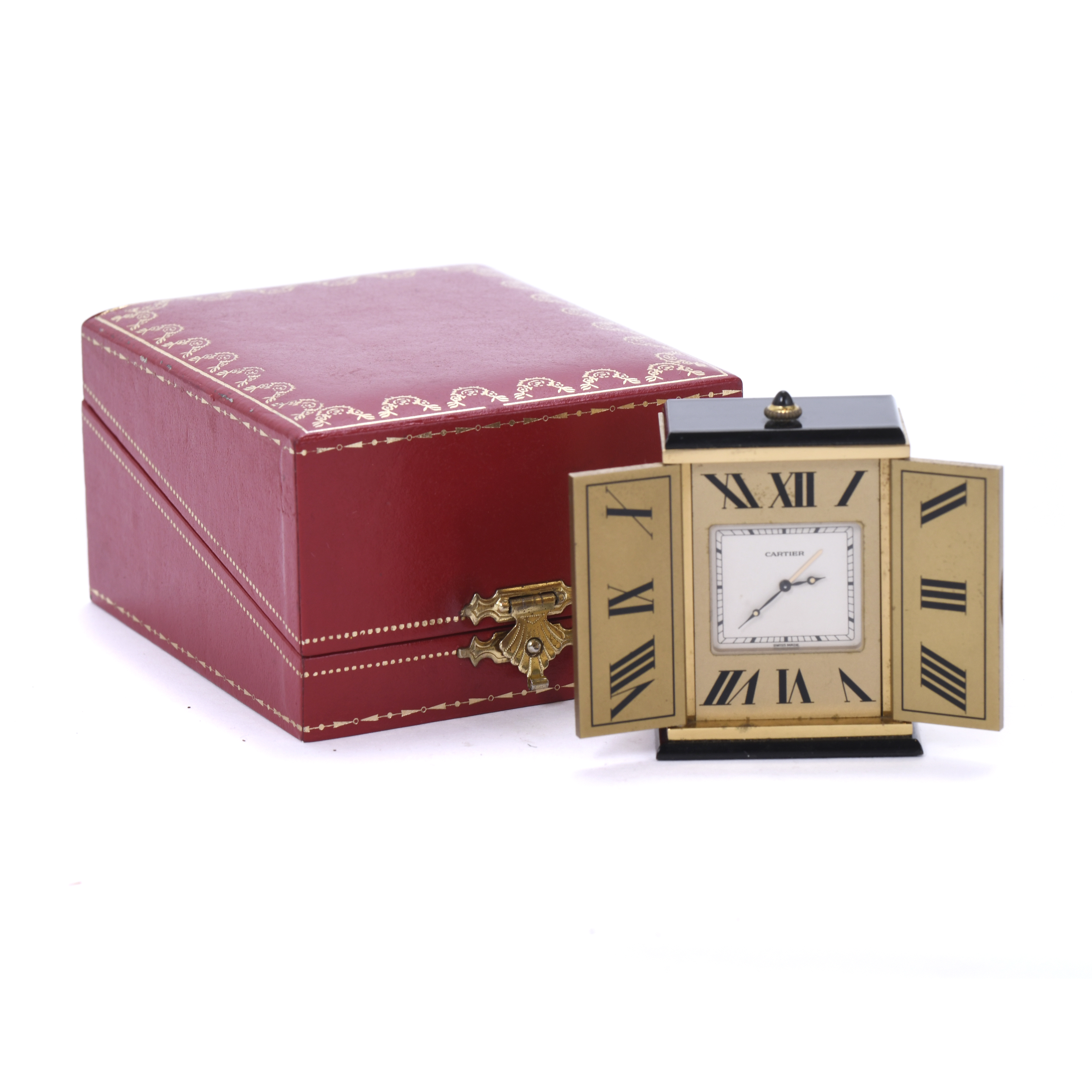 CARTIER. PEQUEÑO RELOJ DESPERTADOR DE SOBREMESA. SIGLO XX. 