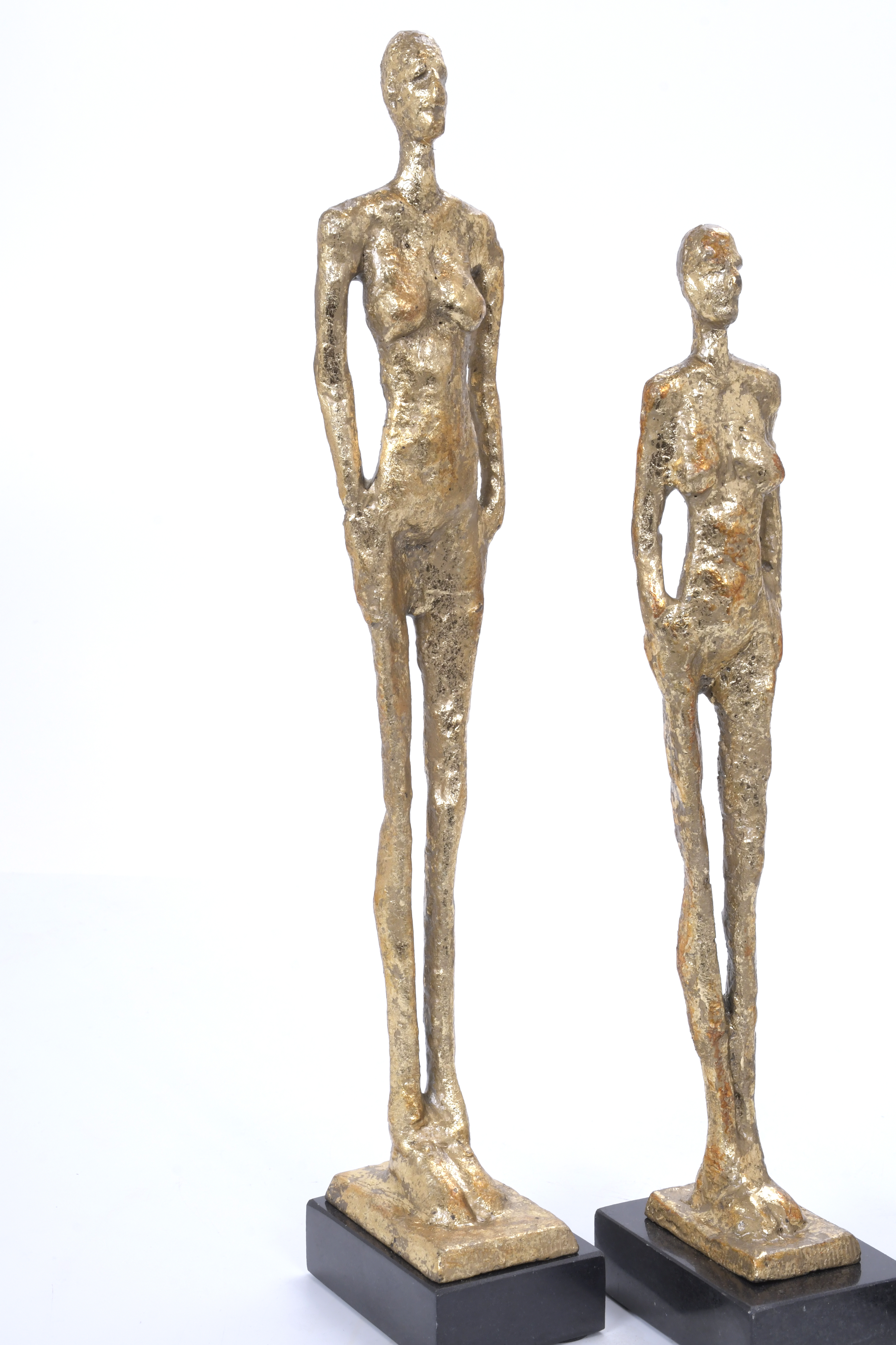 TRES FIGURAS SIGUIENDO MODELOS DE GIACOMETTI.