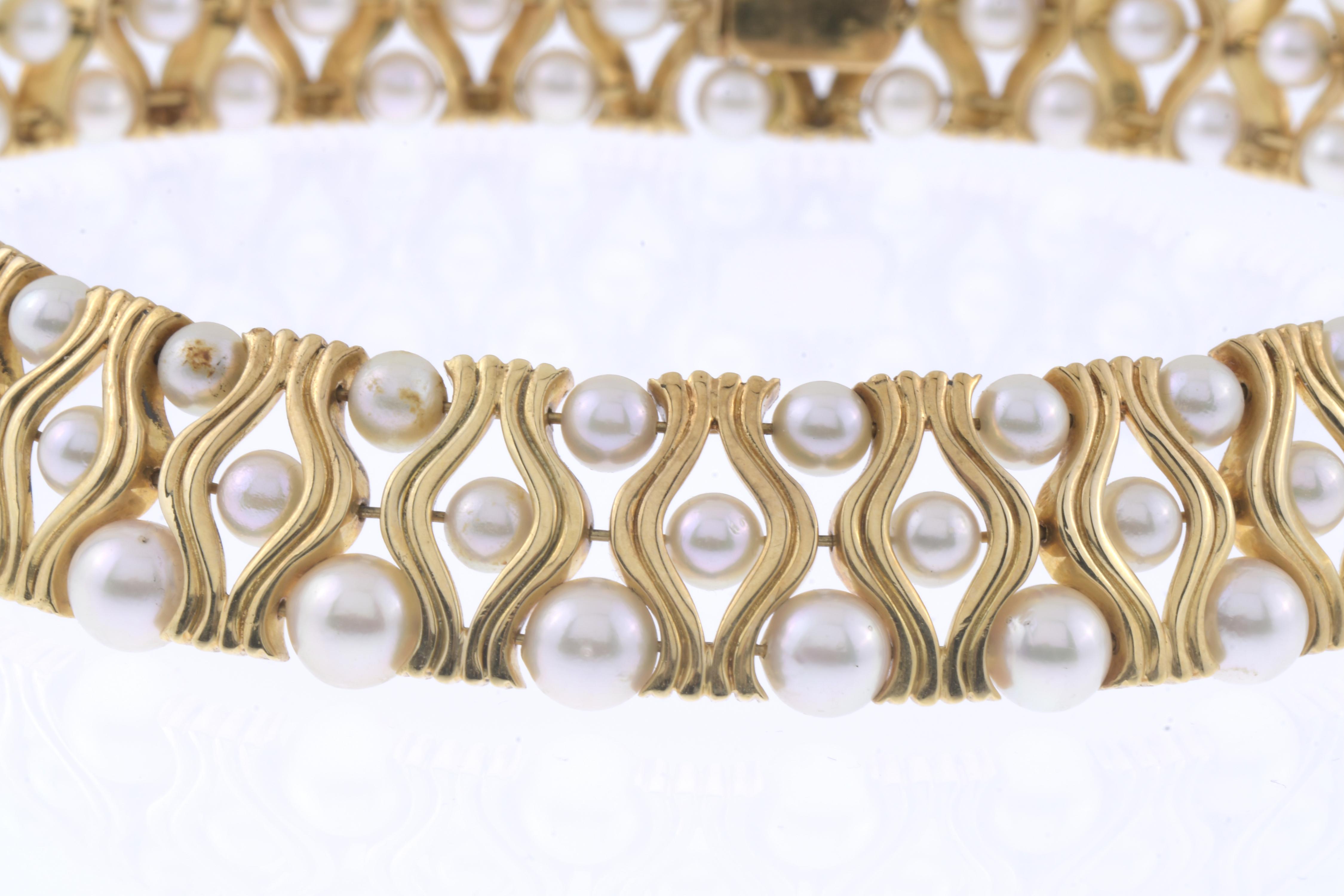 COLLAR CHOCKER CON PERLAS.
