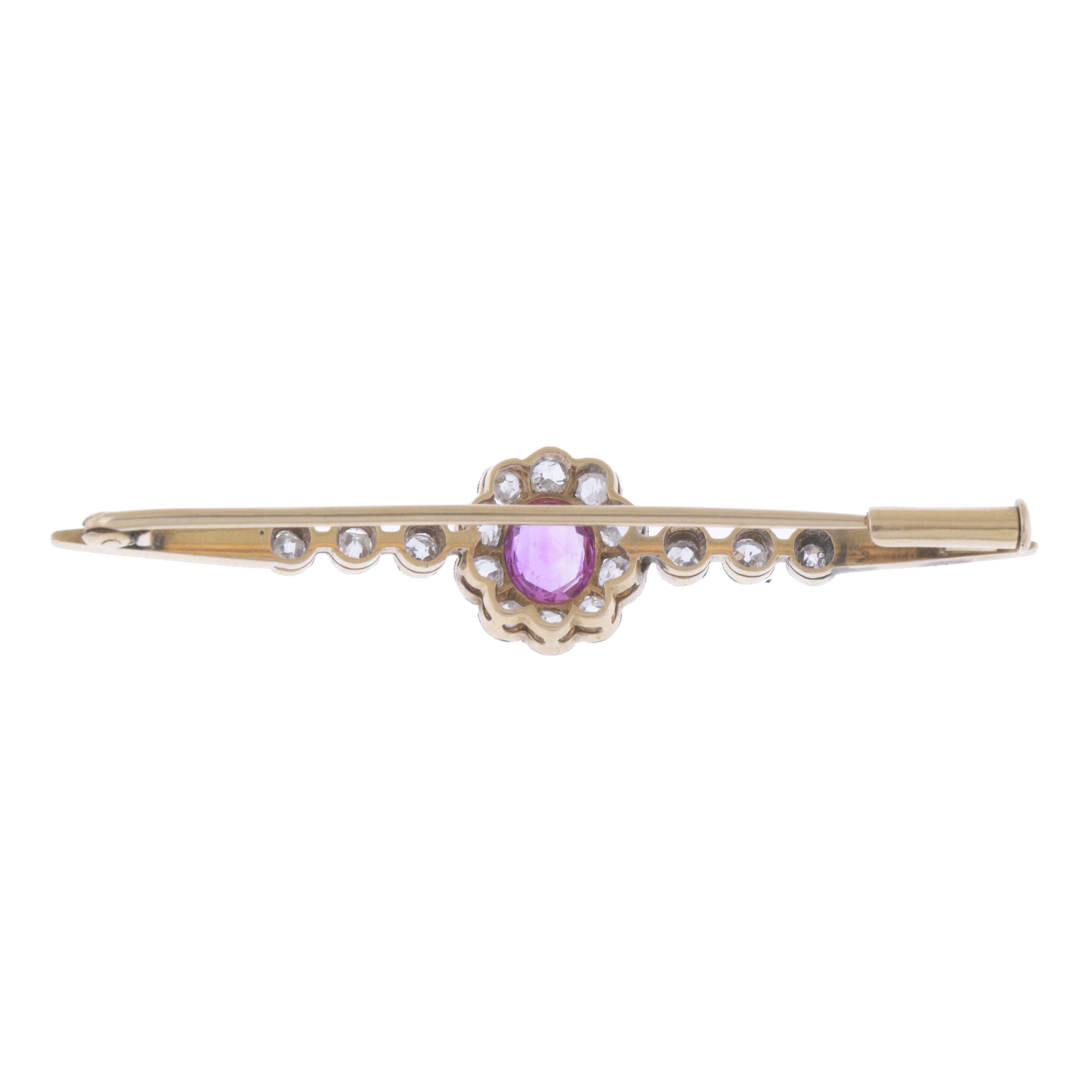 BROCHE CON RUBÍ Y DIAMANTES EN FORMA DE FLOR.