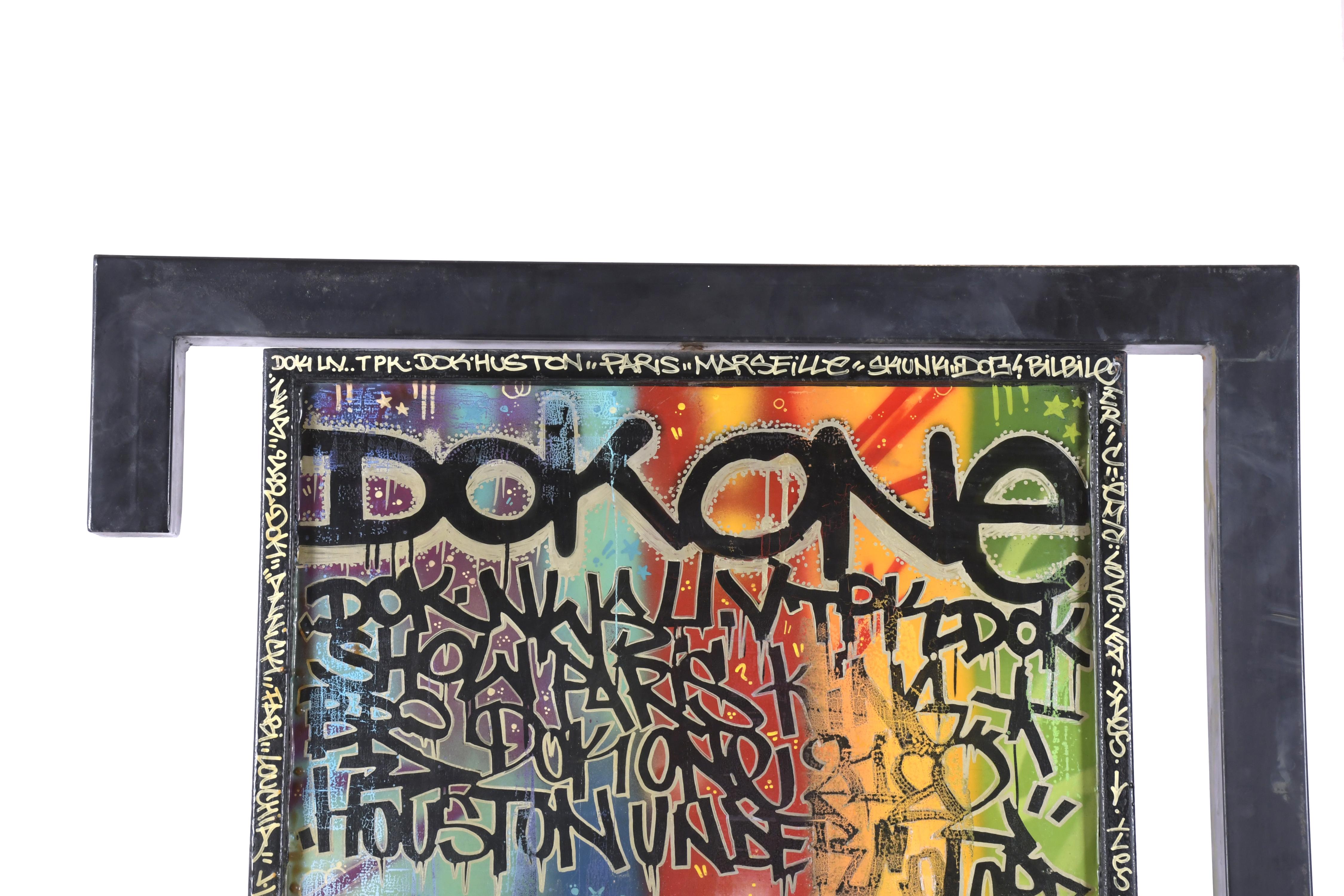 DOK (1979). Puerta urban art