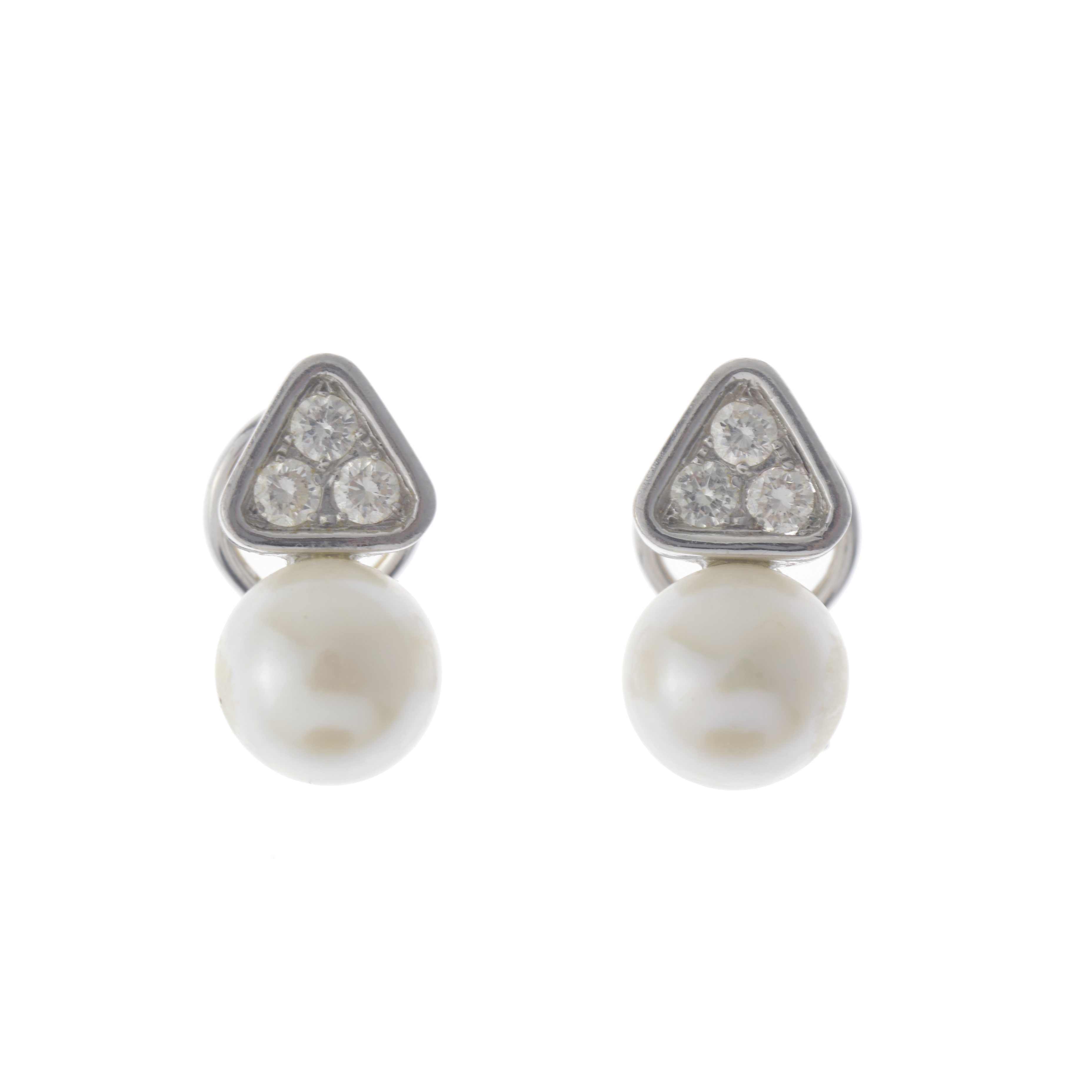 Pendientes con perlas y diamantes.