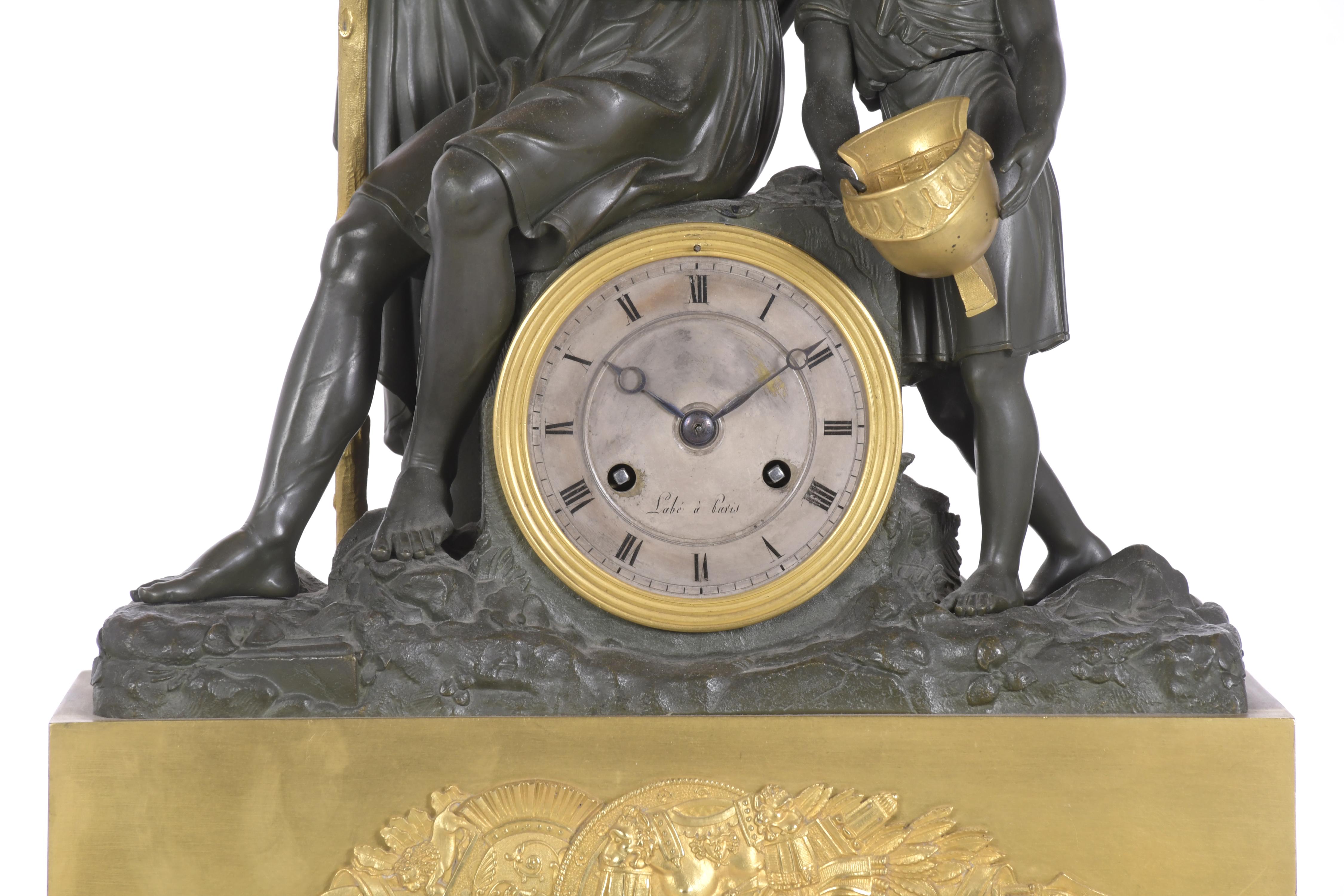 Reloj de sobremesa Imperio con alegoría a la leyenda de Bel