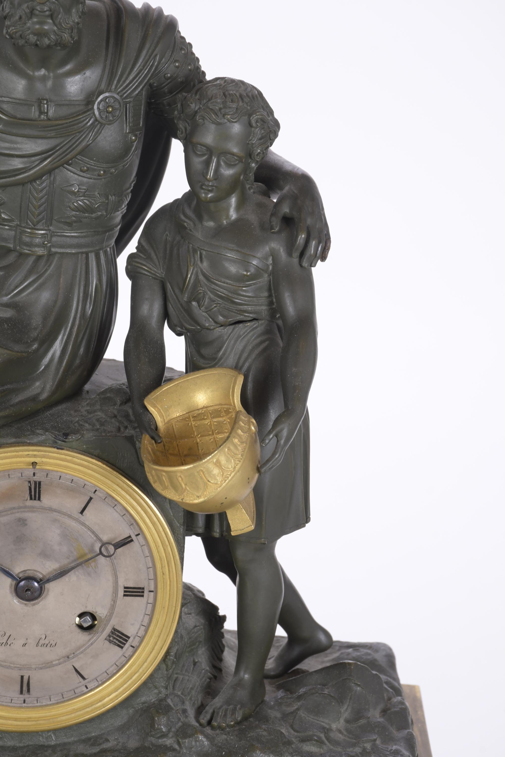 Reloj de sobremesa Imperio con alegoría a la leyenda de Bel