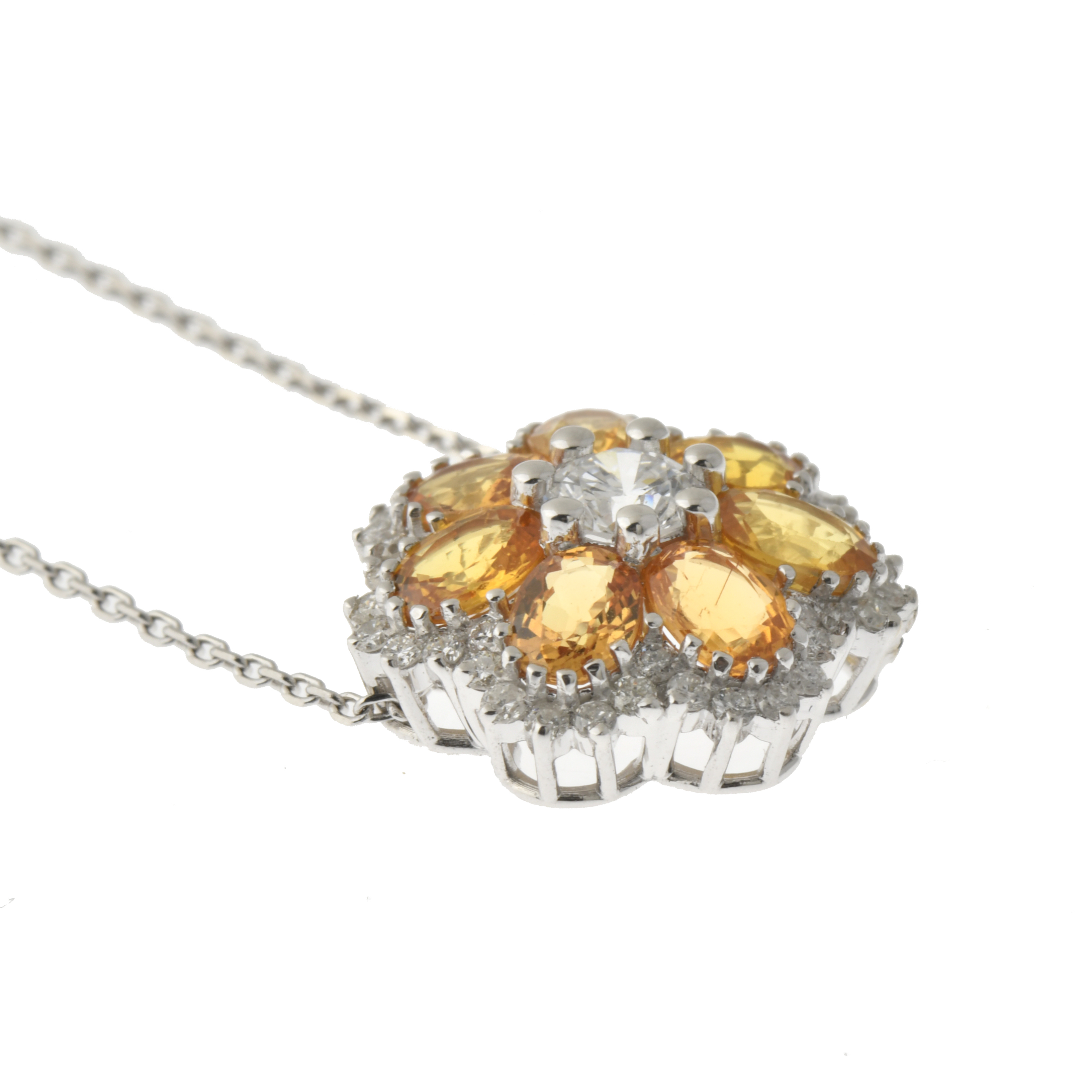 Colgante con zafiros amarillos y diamantes en forma de flor