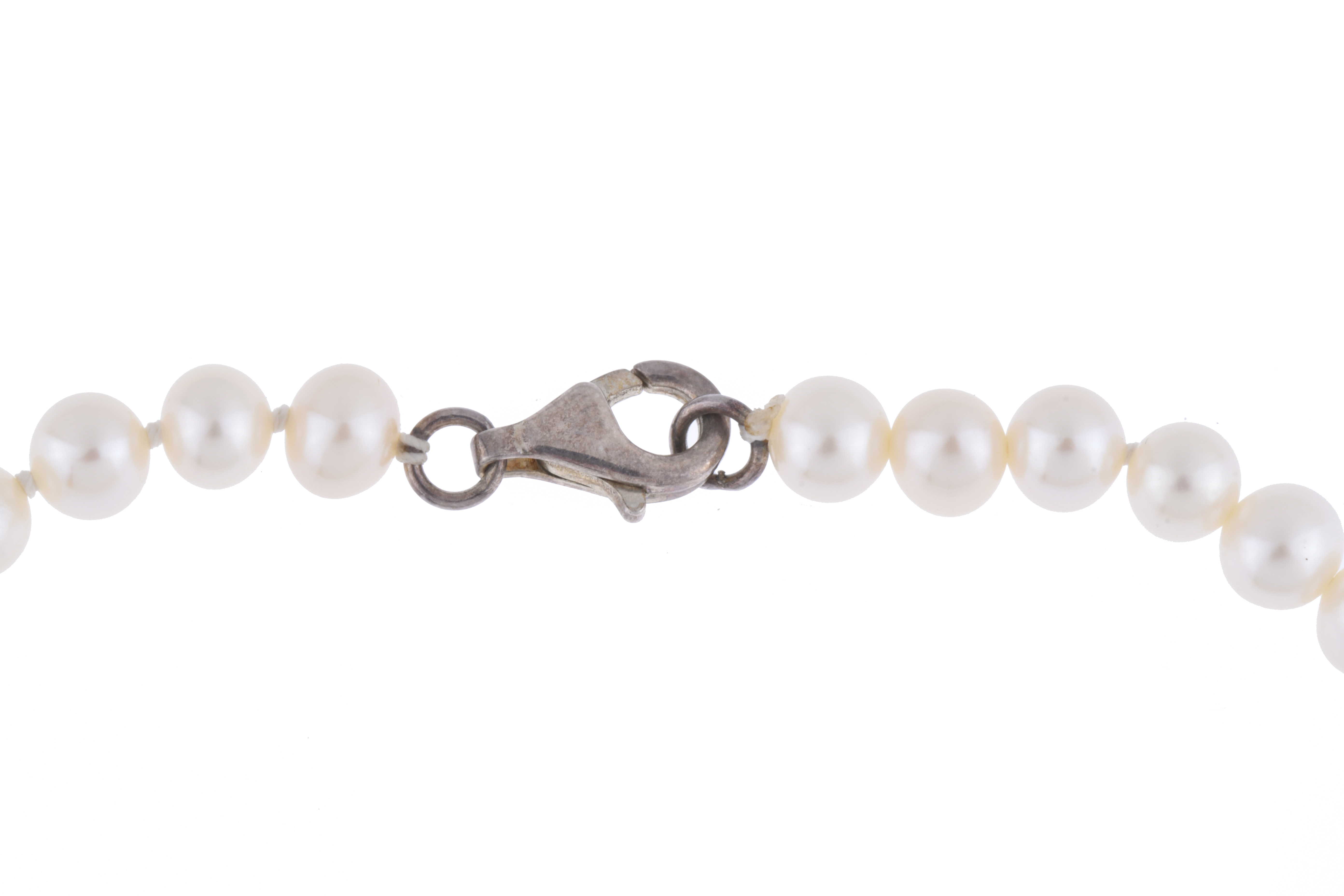 Collar de perlas infantil.