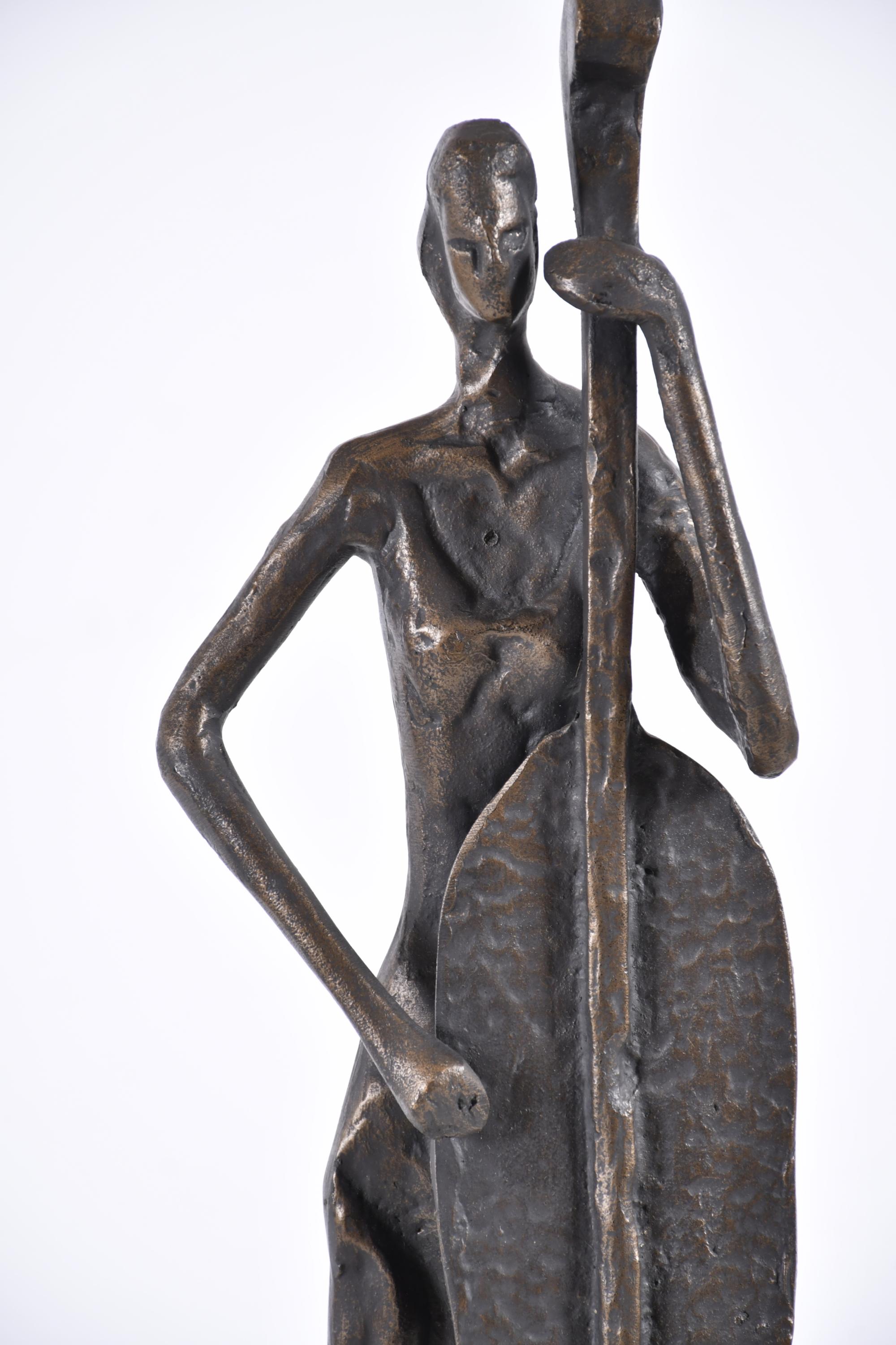SIGUIENDO MODELOS DE GIACOMETTI.  "Trío de músicos".