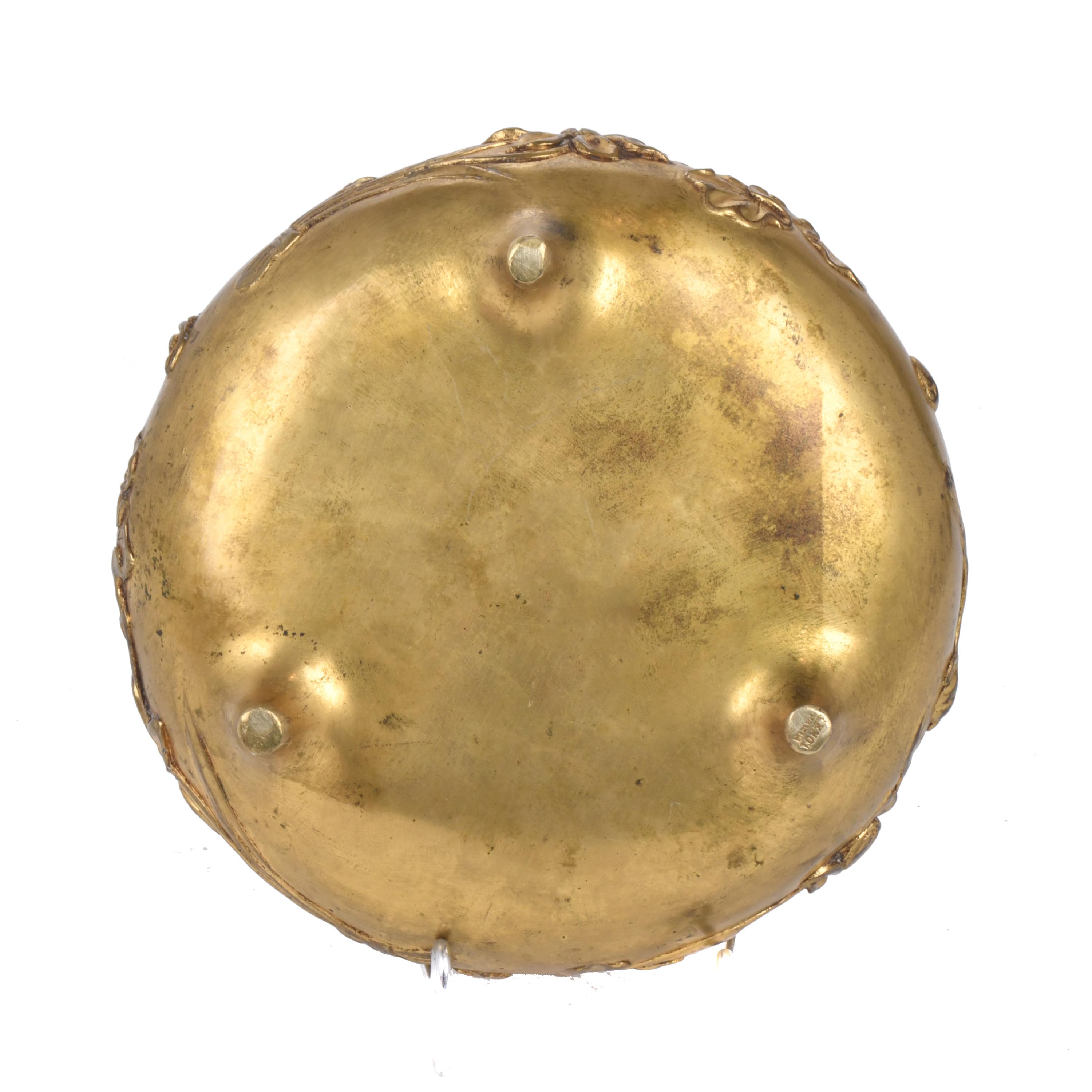 Centro Art Nouveau en bronce dorado, pps. siglo XX. 