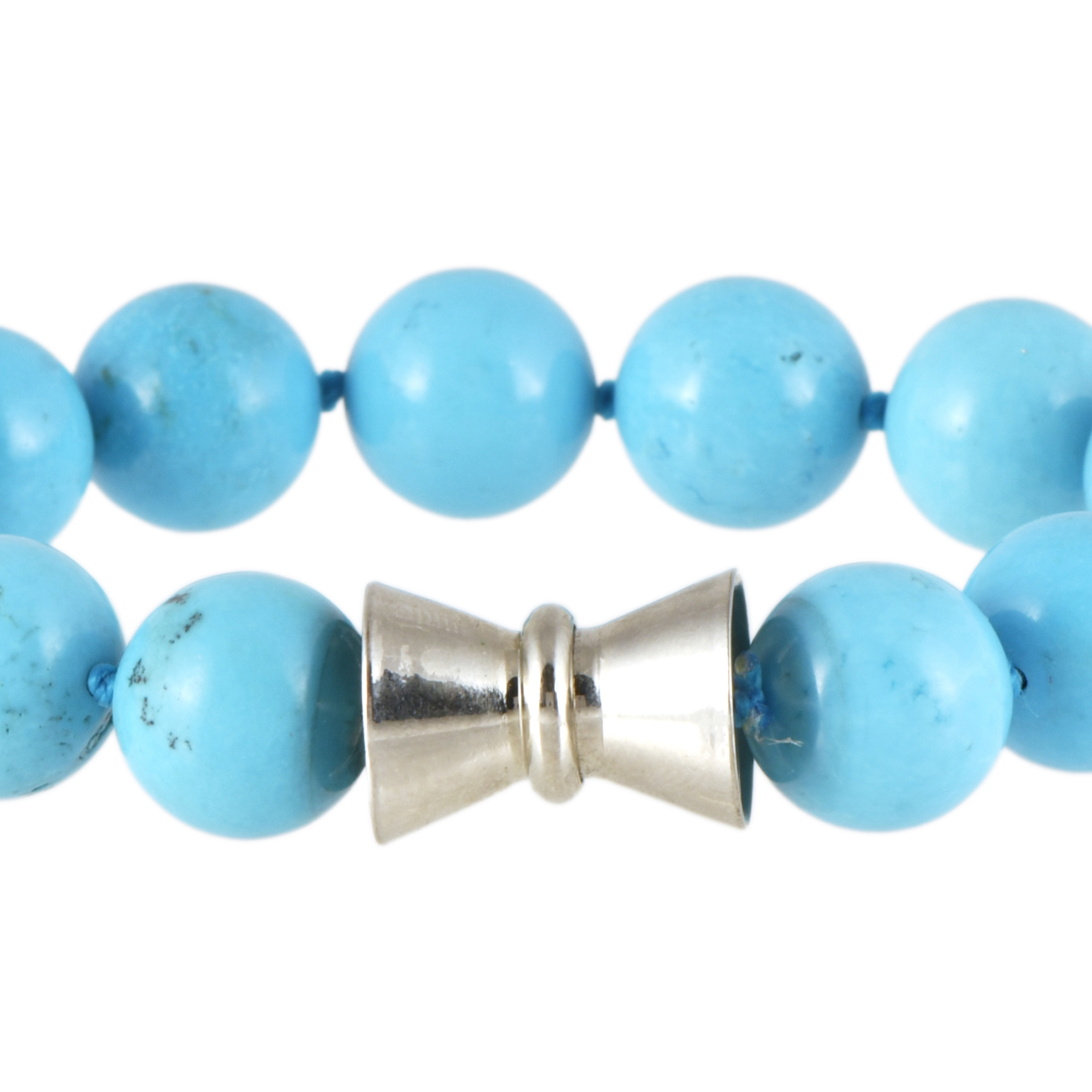 Brazalete de cuentas de turquesas.